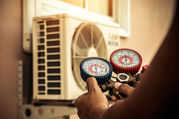 Professional Hvac technician working in Churchton, MD